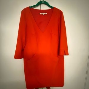 Let right, knee length, 3/4 sleeve dress with pockets and a lace slip underneath